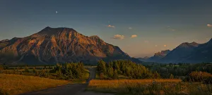 Freeways Prints: Waterton-Glacier mountains at sunset, UNESCO World Heritage Biosphere site with a lone