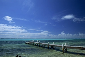 Jetties Prints: Waves breaking on reef on the horizon, with jetty in foreground, Grand Cayman