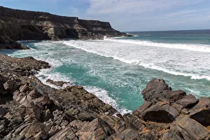 Shot Prints: Waves breaking in a small bay near Los Molinos