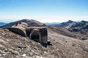 Plateau Prints: Weathered mountain hut on Sierra Nevada high plateau showing history of mountaineering in Spain