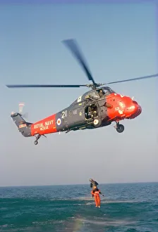 Hanging Prints: Wessex helicopter winching up survivior in rescue from sea