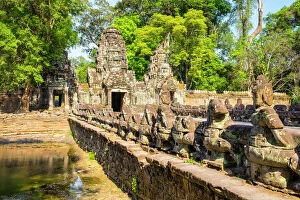 Archaeological Gallery: West gate and Naga bridge at Prasat Preah Khan temple ruins, Angkor, UNESCO World Heritage Site