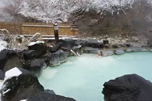 Wes tern man bathing in Zao hot s pring res ort in winter, Yamagata prefecture, Japan, As ia