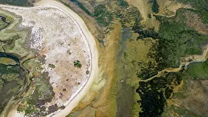 Ecology Prints: Wetlands surround the coastal area with sand and water near Olhao in Algarve