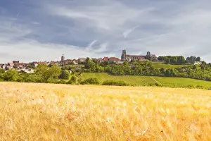 Bourgogne Prints: A wheat field below the hilltop village of Vezelay in the Yonne area of Burgundy