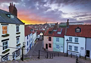 Railing Gallery: Whitby town houses at sunset from the Abbey steps, Whitby, North Yorkshire, Yorkshire, England