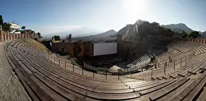 Taormina Prints: Empty white banner displayed in ancient theatre at sunset in Sicily near Taormina