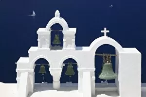 White bell tower and sailing boat, Oia, Santorini, Cyclades, Aegean Sea, Greek Islands, Greece, Europe