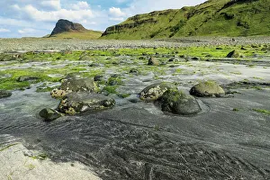 Lava Prints: The white and black sand beach and estuary at Talisker with Preshal More beyond