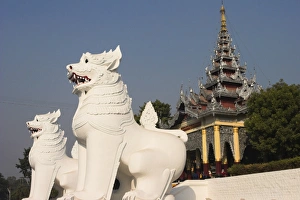 White carved lions guard entrance to Mandalay Hill, Mandalay, Myanmar (Burma), Asia