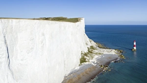 White chalk cliffs of Beachy Head and lighthouse, South Downs National Park, near Eastbourne