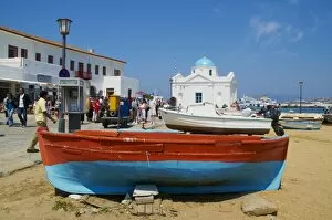 White chapel with blue dome, beach and boats, Hora, Mykonos, Cyclades, Greek Islands