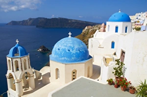 White chapel with the blue dome, Oia, Santorini, Cyclades, Greek Islands, Greece, Europe