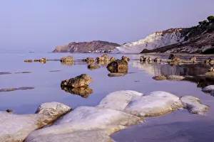 White Cliff Prints: White cliffs known as Scala dei Turchi frame the calm sea at dawn, Porto Empedocle