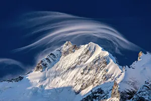 Engadine Prints: White cloud at dawn lights up Piz Bernina and Biancograt, Engadine, Canton of Graubunden