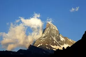 White clouds and the Matterhorn, Zermatt, Valais, Swiss Alps, Switzerland, Europe