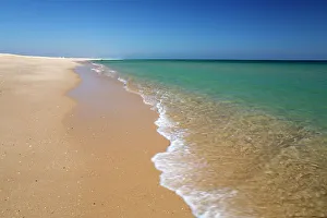 Portuguese Prints: Empty white sand beach and breaking waves of crystal clear sea, Ilha do Farol, Culatra