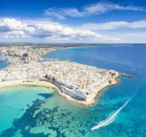 Gallipoli Prints: White sand beach washed by the turquoise sea surrounding Gallipoli, aerial view