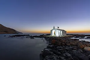 Light Beam Prints: Whitewashed church of Agios Nikolaos at dusk