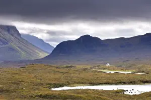 Whitewashed cottage on desolate moorland near Sligachan, Isle of Skye, Highland