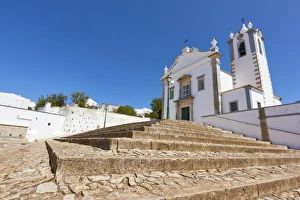 White Colour Prints: Wide angle shot of Matriz Church of Estoi, Algarve, Portugal, Europe