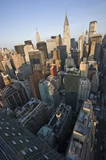 Chrysler Building Prints: Wide angle view of the city skyline including the Chrysler Building and Empire State Building from the UN Plaza Hotel