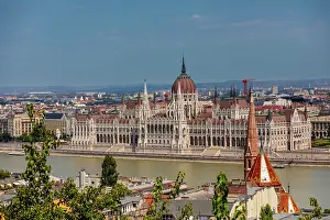 Danube Prints: Wide-angle view of the Hungarian Parliament Building on the Danube riverbank from Buda with rooftops
