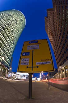 Road Sign Prints: Wide angle view of street sign in new urban development