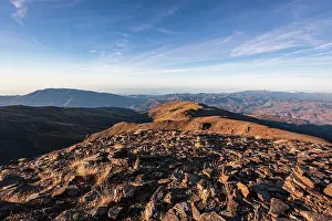 Granada Prints: Wide summit ridge offers panoramic mountain views from Pico del Caballo in Sierra Nevada in Andalusia