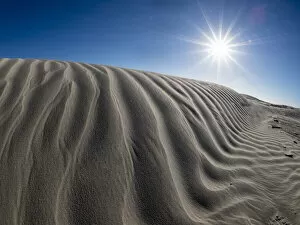 Rippled Gallery: Wind swept barkhan sand dunes on the barrier island of Isla Magdalena