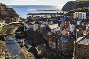 Coastal Village Prints: Winding alleys, fishing boats and sea, elevated view of village in summer, Staithes