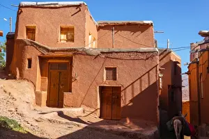 Iran Prints: Winding lanes and donkey in 1500 year old traditional village of red mud brick houses