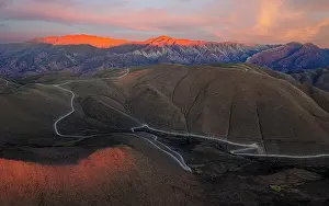 Wonders Prints: Winding road beneath sunset sky, Serrania de Hornocal, Humahuaca, Jujuy, Argentina