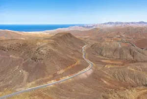 Winding Road Prints: Winding road crossing the volcanic landscape towards Sicasumbre Astronomical Observatory