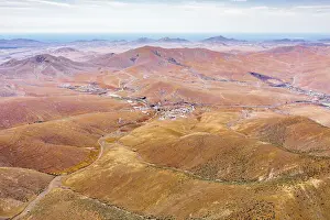 Freeways Prints: Winding road in the desert landscape from Mirador del Risco de las Penas viewpoint