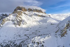 Mountain Pass Prints: Winding road in the snow, aerial view, Pordoi Pass, Dolomites, Trentino-Alto Adige, Italy