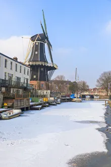 Windmills Prints: Windmill De Adriaan along the frozen canal of Spaarne river, Haarlem, Amsterdam district
