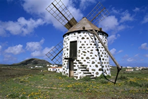 Wind Mill Prints: Windmill set in volcanic landscape