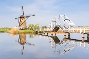 Traditionally Dutch Prints: Windmill and sluice on the canal