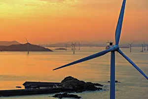 Windmills Prints: Windmills in a golden sunset, Pingtan Island, Fuzhou City, Fujian Province, China