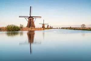 Windmills in a row on the canal, Kinderdijk, UNESCO World Heritage Site, Molenwaard municipality