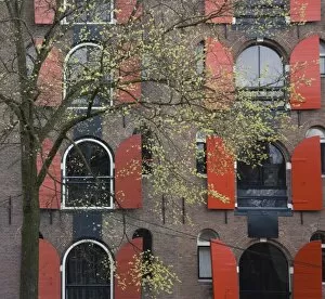 Window shutters on an old canal warehouse, Amsterdam, Netherlands, Europe