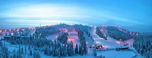 Ski Resort Prints: Winter dusk over the snowy ski slopes of Ruka tourist resort