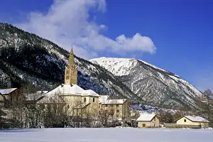 Alps Prints: Winter landscape with a church and mountains in Val-des-Pres