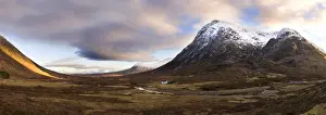 Cottage Prints: Winter panoramic view of Rannoch Moor showing lone whitewashed cottage on the bank of a river
