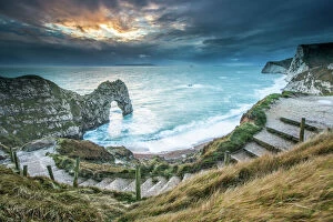 Ethereal Gallery: A winter sunset at Durdle Door on the Jurassic Coast, UNESCO World Heritage Site