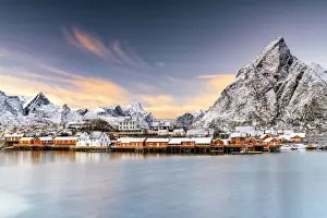 Sakrisoy Prints: Winter sunset over snowcapped mountains and Sakrisoy village by the frozen sea