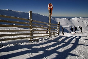 Skier Prints: Winter view of fence