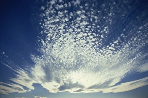 Generic Location Prints: Wispy white clouds fan out in a blue sky, Provence, France, Europe