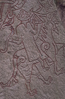 Witch from Icelandic Edda riding a wolf, detail of standing stone circa 1000AD Witch from Icelandic Edda riding a wolf, detail of standing stone circa 1000AD